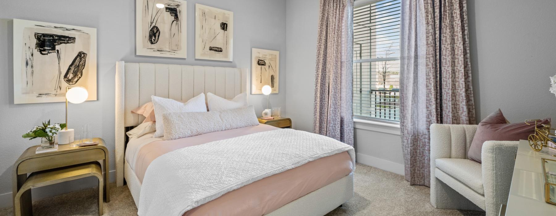 a bedroom with a bed and a chair